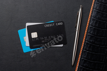 Black credit card on office table