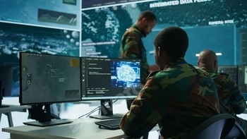 Programming engineer soldier handles AI brain and deep learning data