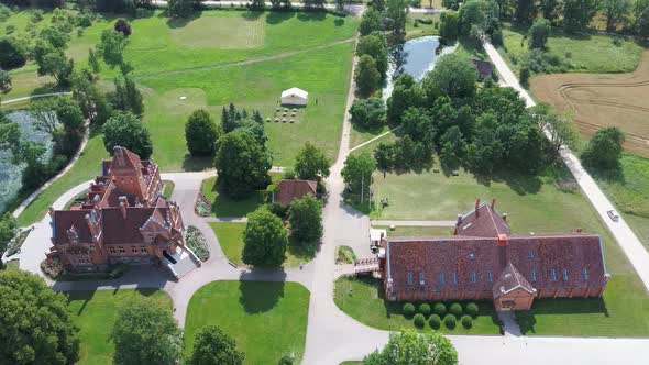 Jaunmoku Brick Medieval Castle Near Tukums, Latvia  Aerial Dron 4k Shot Jaunmokas Manor Park.