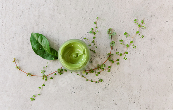 Clay mask in jar on table