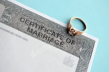 Canadian Certificate of registration of marriage blank document and wedding ring