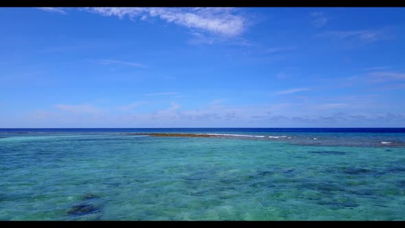 Aerial drone view nature of tranquil resort beach lifestyle by aqua blue water and clean sandy backg