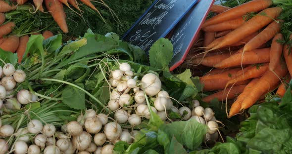 Fresh vegetables on stalls in a southern France market.