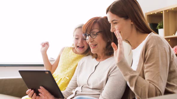 Mother, Daughter and Grandmother with Tablet Pc