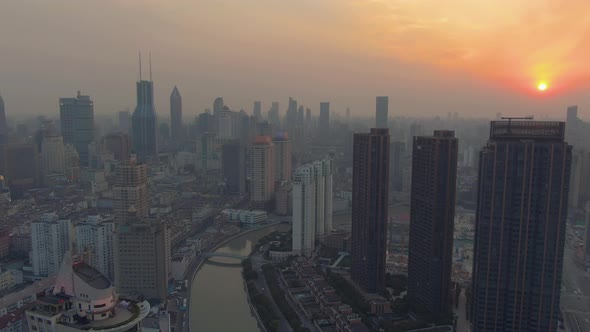 Shanghai City at Sunset. Huangpu Cityscape. China. Aerial View