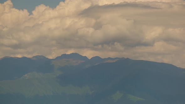 Caucasus Mountains landscape timelapse moving clouds. View from Telavi, Georgia