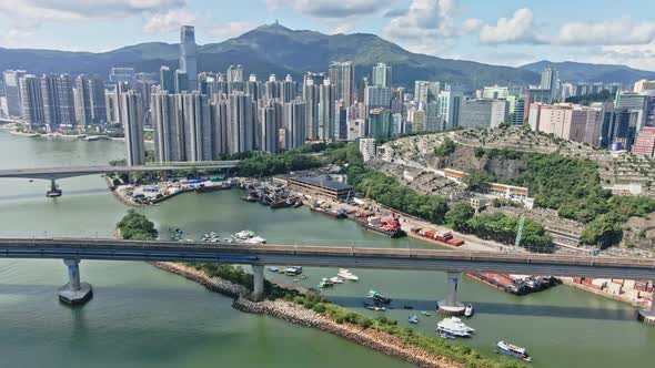 MTR Airport Express crossing the bridge in Tsuen Wan, Hong Kong; aerial
