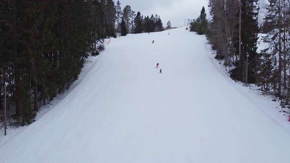 Aerial View of Downhill Skiing at Local Ski Resort, Ski Lift. Russia, Leningrdaskaya Oblast, Village