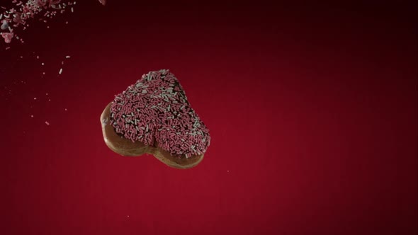 Doughnuts falling and bouncing in ultra slow mo 