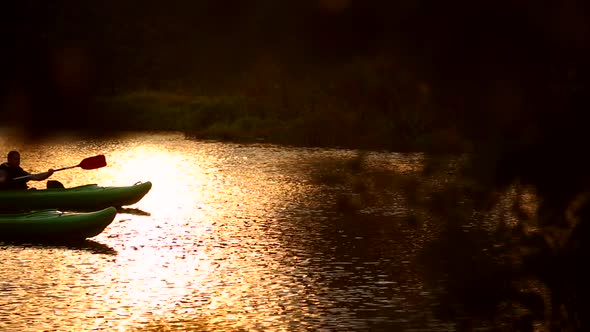 Two Canoeists on the river