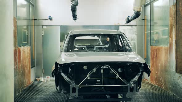 Car Body Is Getting Covered with Zinc in a Factory Unit