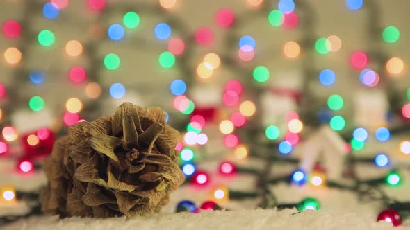 Cedar Christmas Cone on White Snow Christmas Background