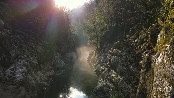 River in a Narrow Canyon with White Rocks