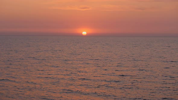 Red Sunset in the Sea.