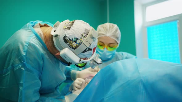 Surgery team in operating room. Medical team during surgery in operating theater