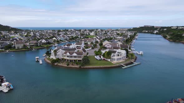 Aerial View of Canal with Beautiful Houses Around It