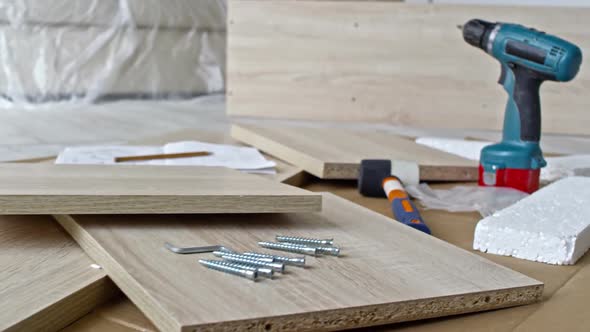 Tools and Pieces of Furniture Lying on Floor