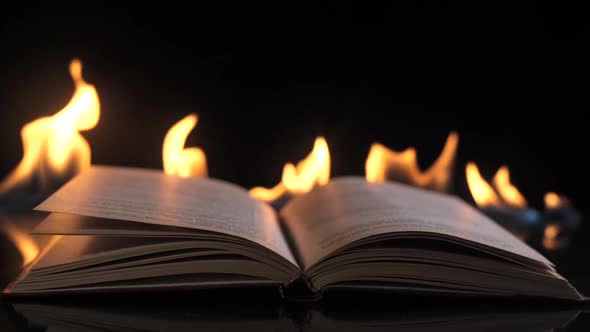 An Open Book Against the Backdrop of Fire