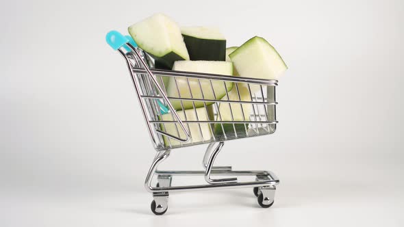 Fresh zucchini slices in a supermarket shopping card model