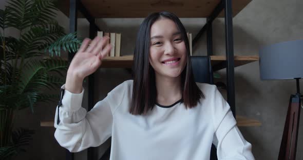 Happy Asian Girl Student Looking At Camera Making Video Call