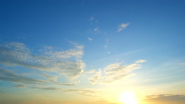 4K UHD : Time lapse of colorful sky during beautiful sunset. Romantic clouds.