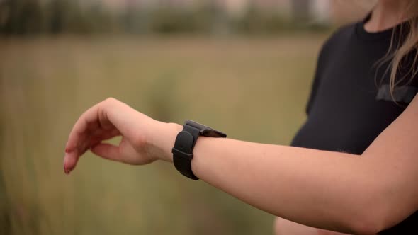 Heart Rate Smart Watch.Runner Checking Pulse On Smartwatch On Recreation Running Workout.