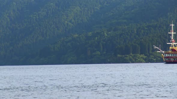 Close-up, The view of traditional japanese ship enters right to the picture in Ashi lake