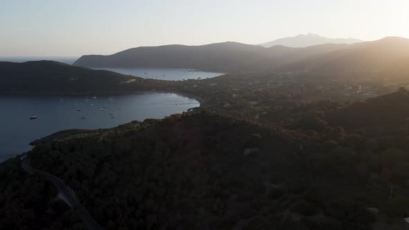 Aerial view of Lacona bay at sunset, Elba Island, Tuscany, Italy.