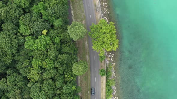 Moving Cars Near The Lake