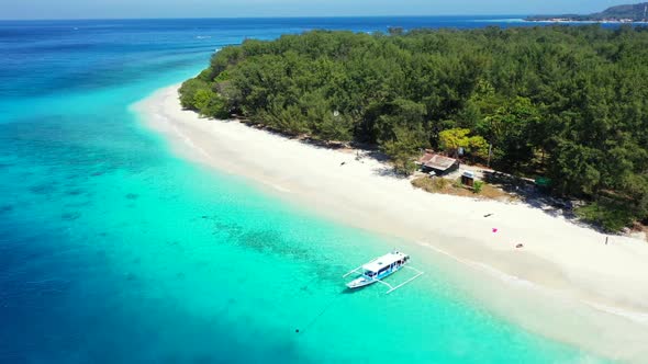 Aerial drone view panorama of exotic seashore beach voyage by clear sea with white sandy background 