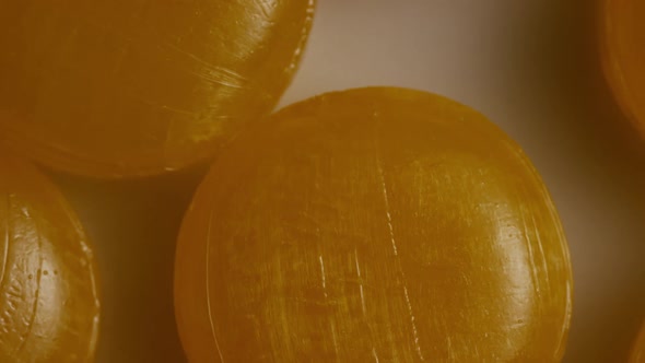 Rotating shot of butterscotch candies 