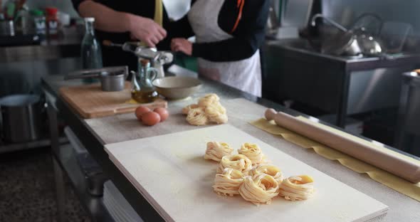 People working inside pasta factory - Traditional italian pasta