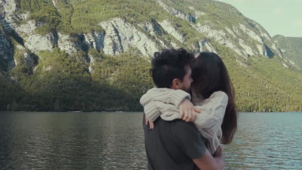 Beautiful couple dancing on pier