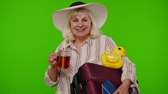 Mature Woman Traveler Tourist Passenger Drinking Cocktail Holding Passport Tickets Luggage Bag