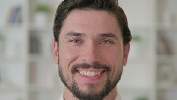 Close Up of Smiling Young Man Face