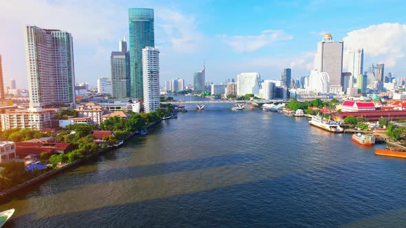 4K UHD : Bangkok River drone view. Flying over the Chao Phraya River