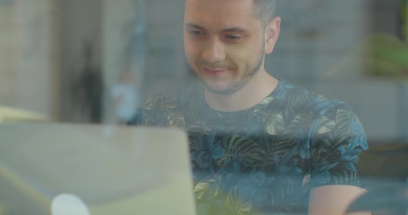 Man Freelancer Using Laptop Online Working in Internet, Guy Typing on Computer Surfing Web Looking