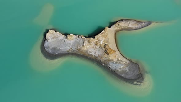 Drone View of the Turquoise Lake Formed As a Result of Mining Waste