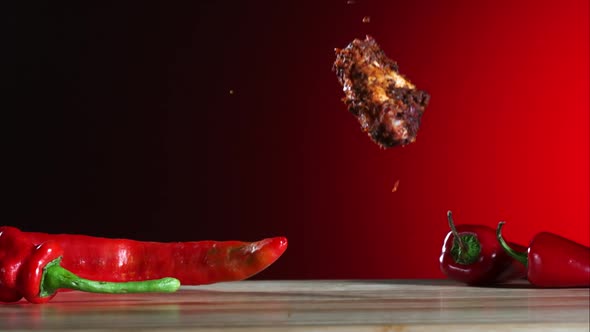 Smoked chicken wings falling and bouncing in ultra slow motion 1500fps - CHICKEN WINGS PHANTOM 