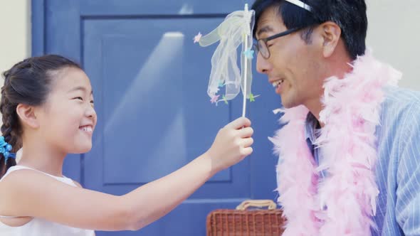 Father and daughter in fairy costume