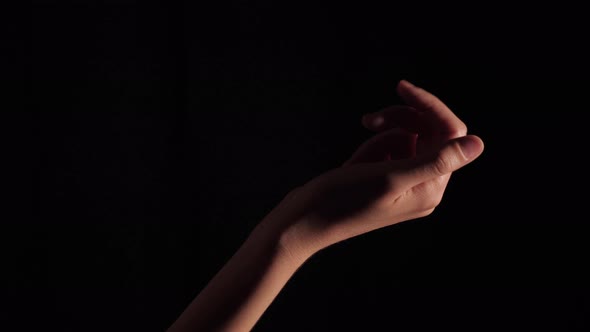 Female Hands MusicianOn A Black Background