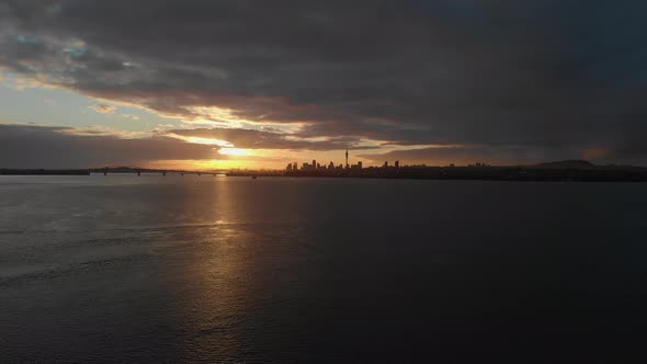 Aerial view over Waitemata Harbour at sunrise of Auckland cityscape, New Zealand