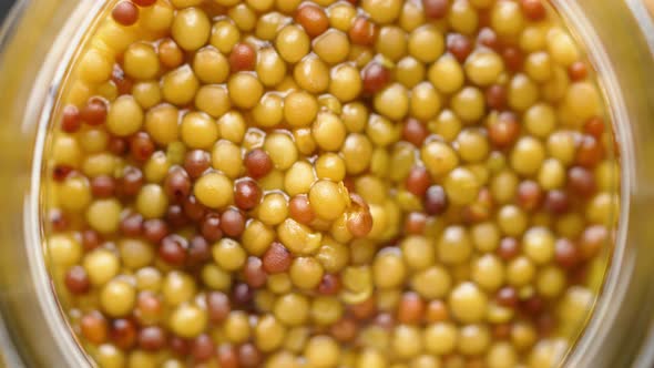 French Mustard with Whole Seeds Served in Glass Jar