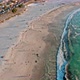 Aerial View the Inviting Blue Water of Camps Bay Beach at Sunset - VideoHive Item for Sale