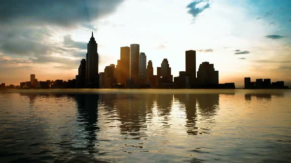 Skyline with Skyscrapers and Sea at Sunset