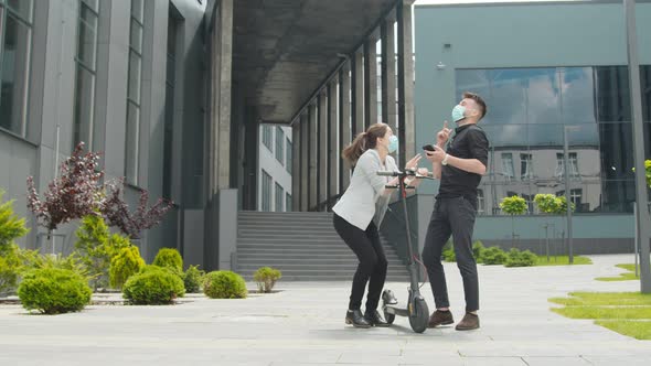 Two Young Successful, Happy Students Who Meet in a Strict Quarantine