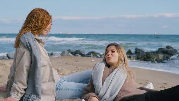 Beautiful Girls Walk Near the Sea