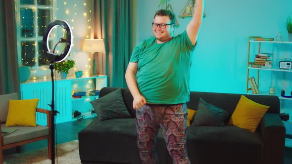 Obese Guy Dancing Funny in Front of the Smartphone