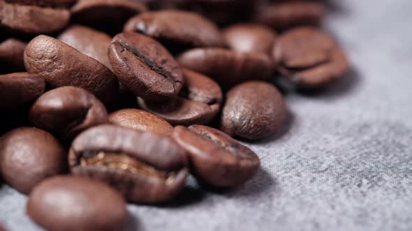 Fresh Coffee Beans on Black Background Close Up 