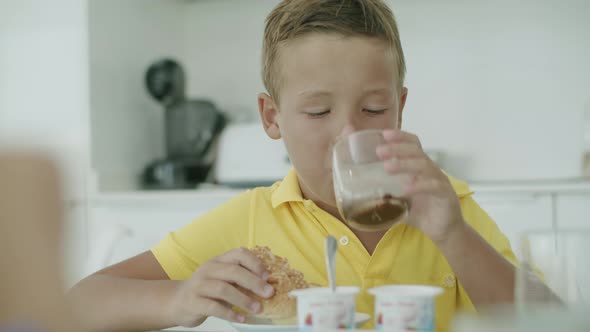 Breakfast with cocoa and sandwich for a kid